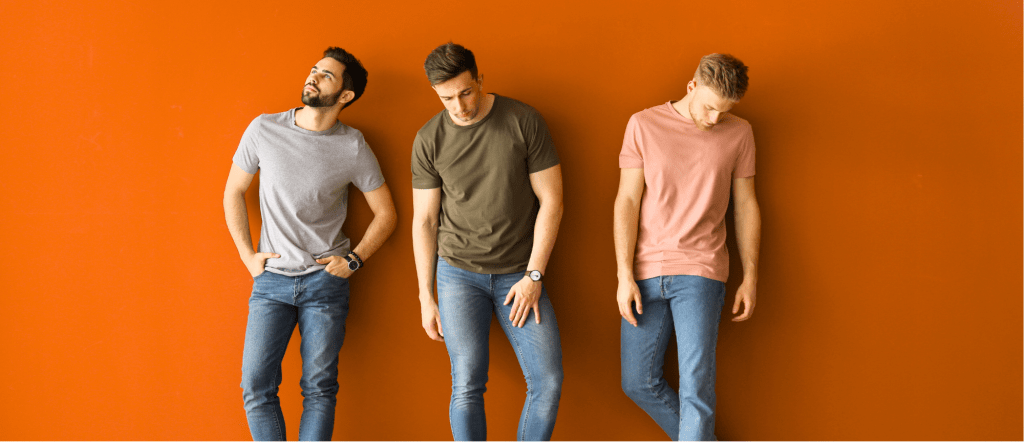 three men against an orange backdrop